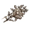 Broche argent sur or et diamants