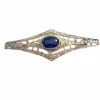 Broche Art Déco des années 1930 en or 18 kt et platine avec diamants et saphir synthétique