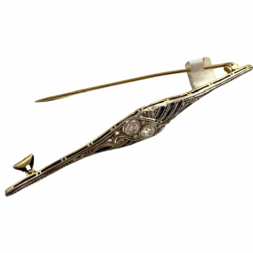 Broche Art Déco en or et platine avec diamants et saphirs