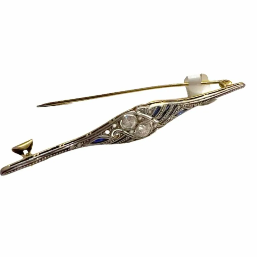 Broche Art Déco en or et platine avec diamants et saphirs