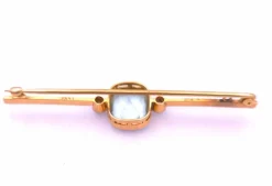 Broche Art Déco en or ornée d'une belle aigue marine et de diamants
