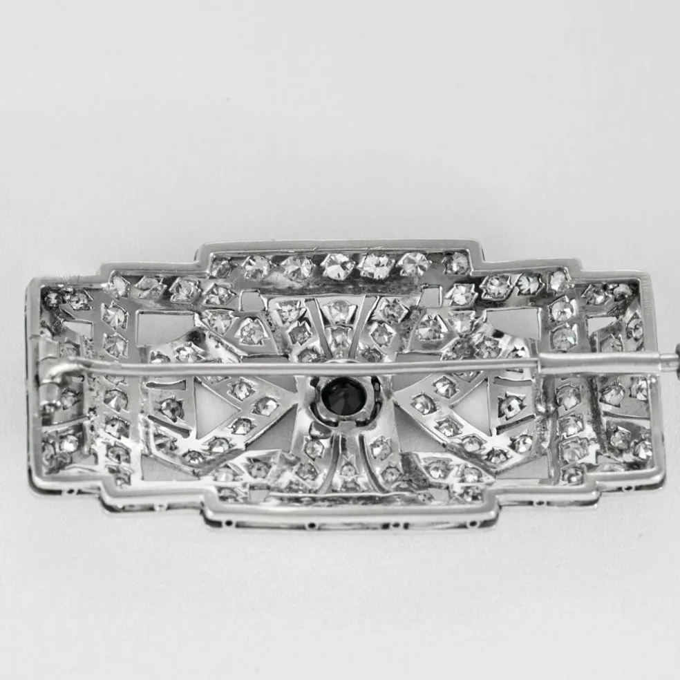 Broche art déco en platine, diamants et saphir