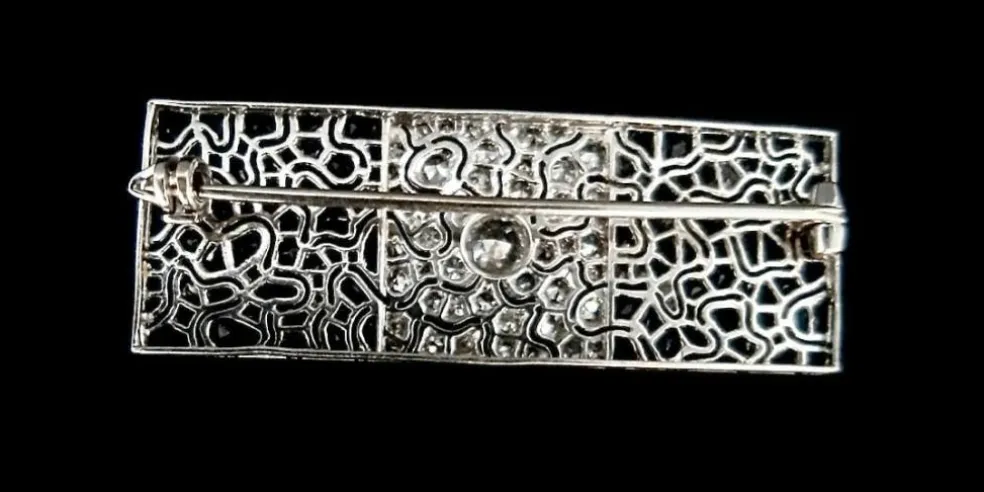 Broche Art Déco en platine sertie de saphirs et diamants