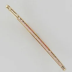Broche art déco ligne rubis et diamants