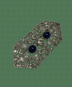 Broche art deco platine or jaune diamants et saphirs
