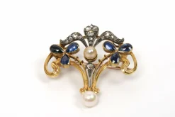 Broche Art Nouveau en or jaune, saphirs, diamants taille rose et perles