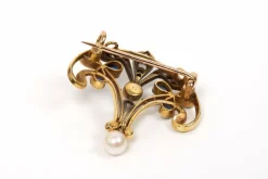 Broche Art Nouveau en or jaune, saphirs, diamants taille rose et perles