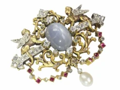 Broche avec deux sphinges diamant, saphir