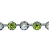 Broche barette en or 18 carats et platine en perles et peridots