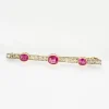 Broche barrette art déco or jaune et platine rubis diamants