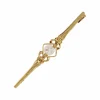 Broche barrette or jaune perle de culture