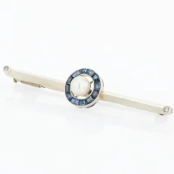 Broche barrette perle et saphirs calibrés