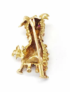 Broche chien ébouriffé or jaune