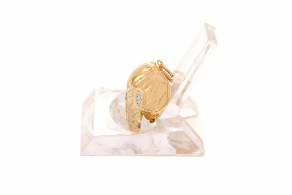Broche contemporaine en or jaune et blanc 18 carats sertie de diamants