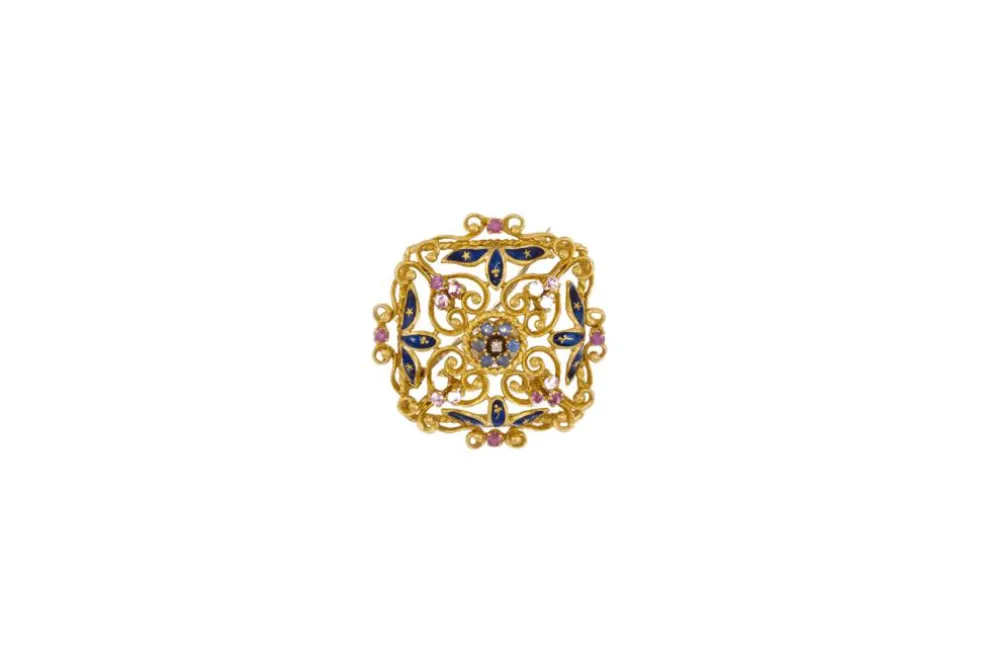 Broche coussin en or jaune avec rubis et saphirs