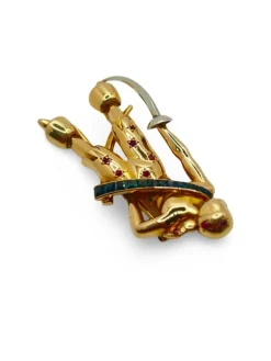 Broche créateur en or jaune et pierres précieuses