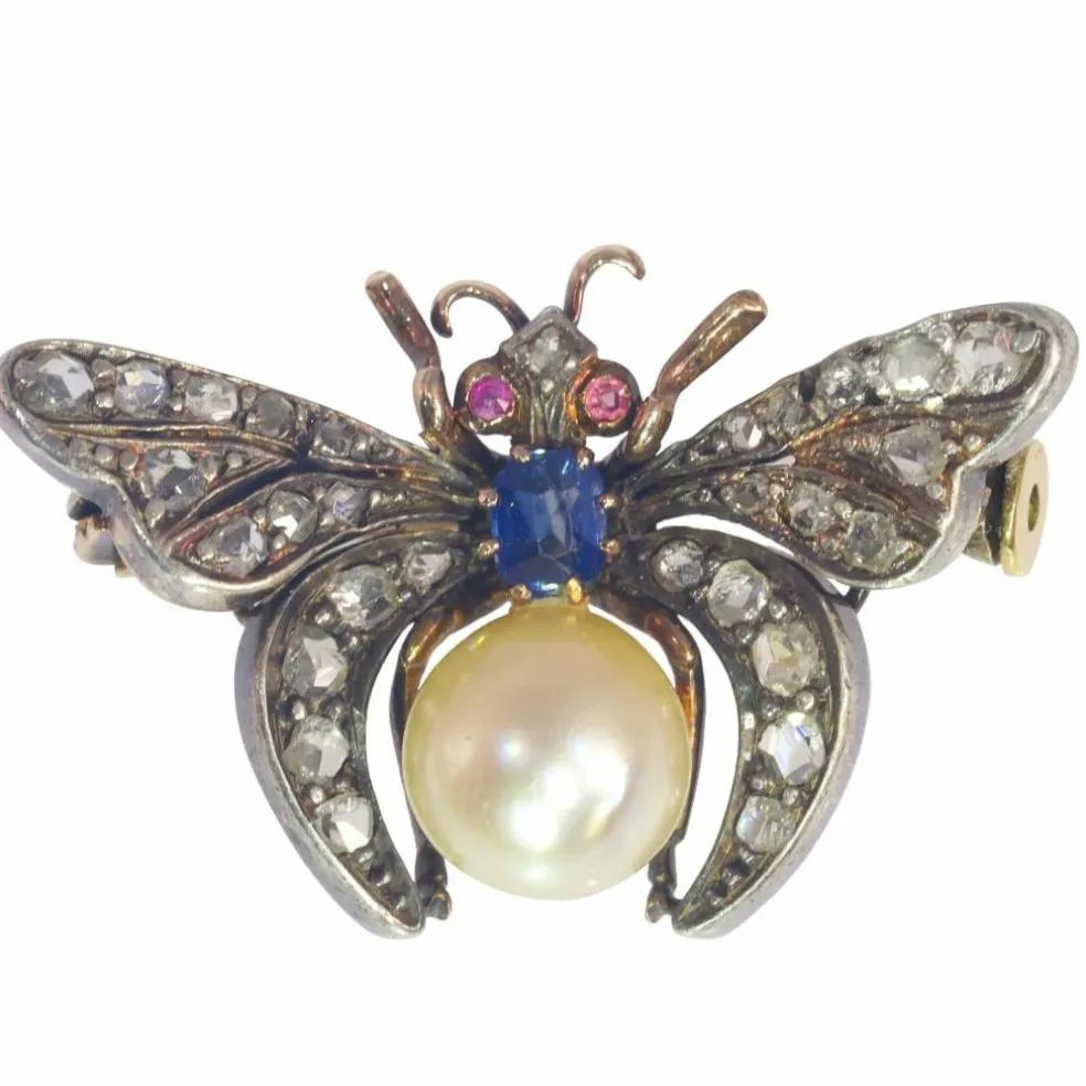 Broche diamant et perle