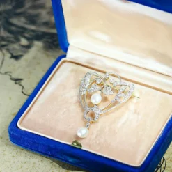 Broche diamant et perle