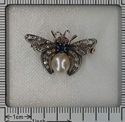 Broche diamant et perle