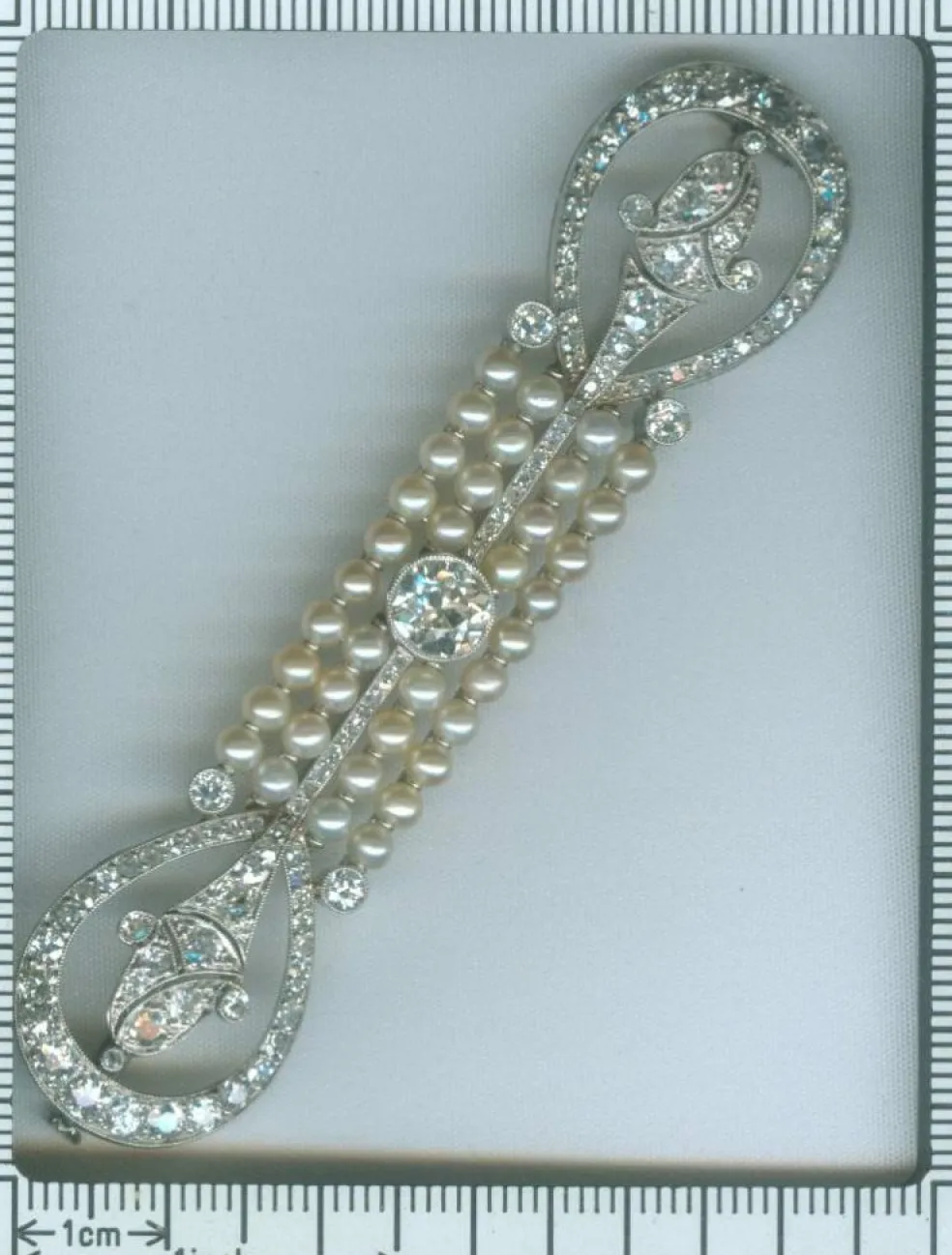 Broche diamants et perles