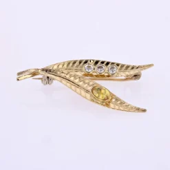 Broche double feuille en or
