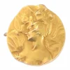 Broche en or