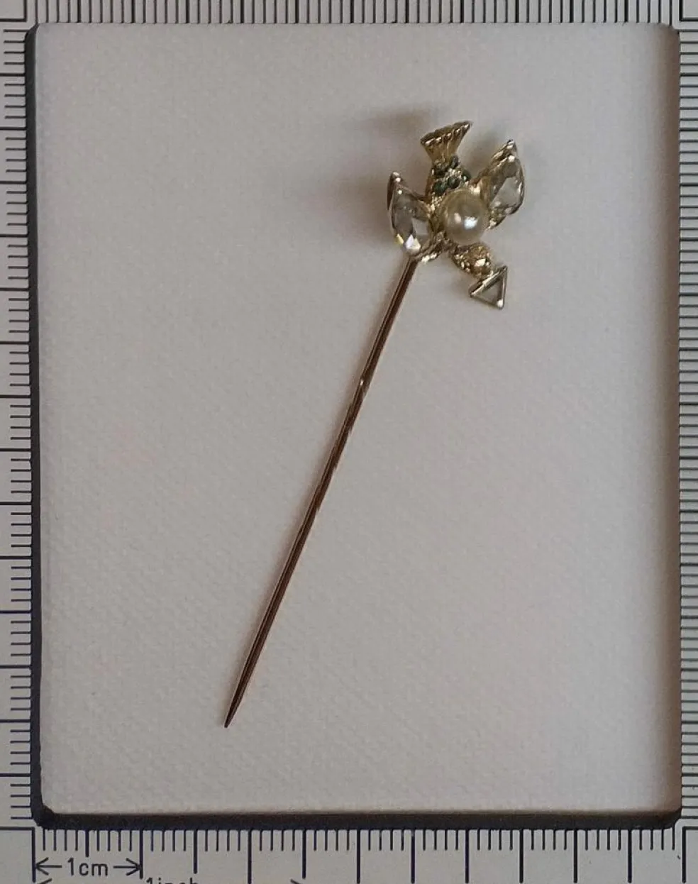 Broche en or avec diamants