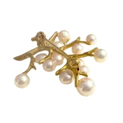 Broche en or avec perles