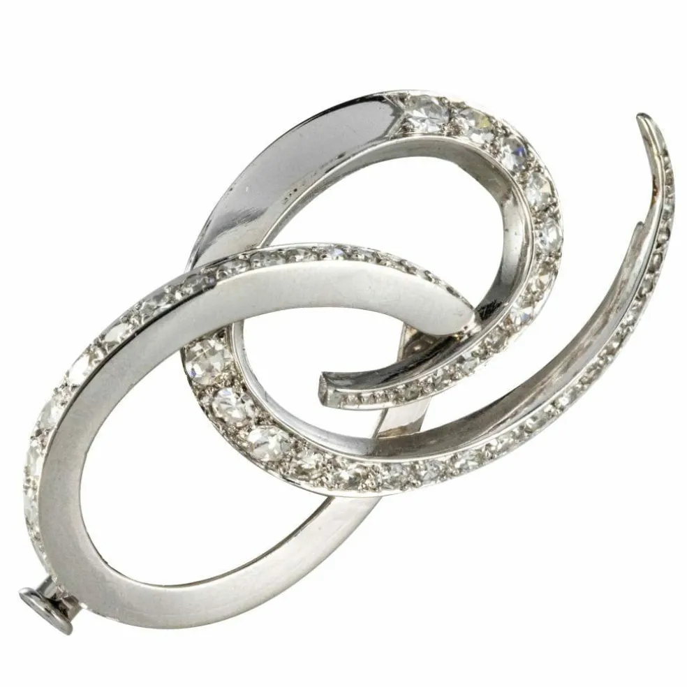 Broche en or blanc et diamants