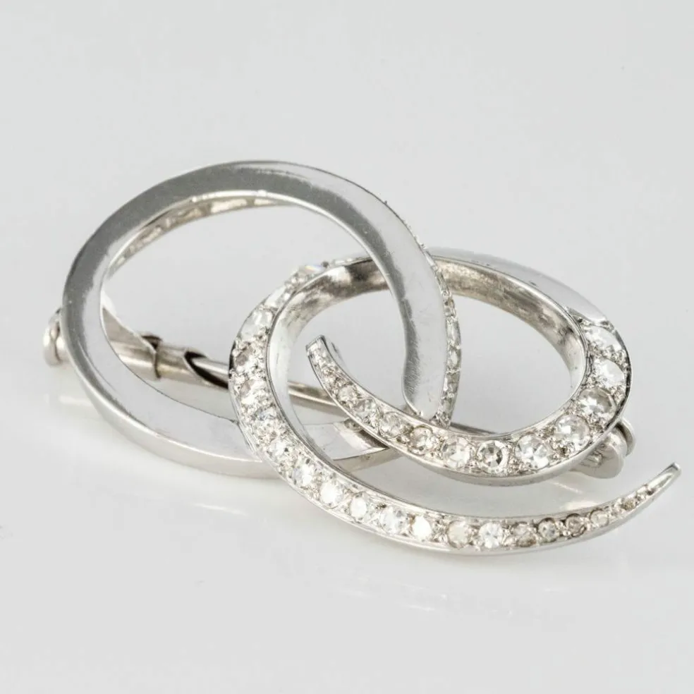 Broche en or blanc et diamants
