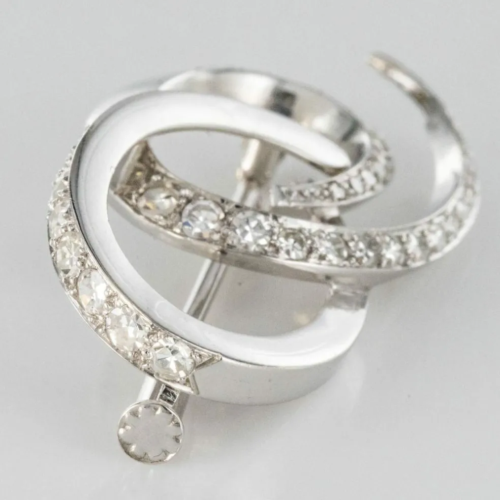 Broche en or blanc et diamants