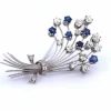BROCHE EN OR BLANC 18KT - SAPHIRS ET DIAMANTS