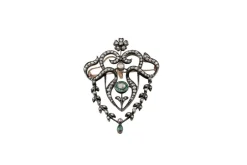 Broche en or et argent avec diamants et émeraudes