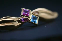 Broche en or jaune 18 carats, ornée de topaze bleue, tourmalines roses et quartz orange