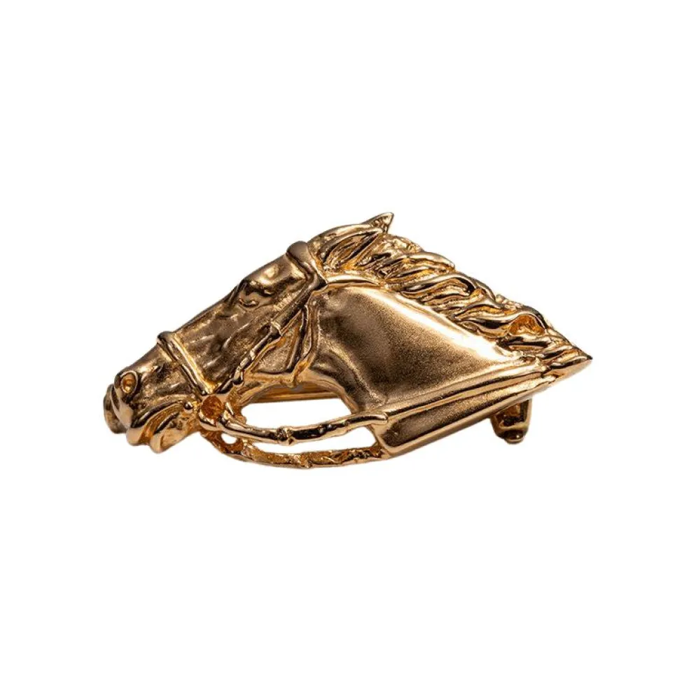 Broche en or jaune avec tête de cheval