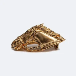 Broche en or jaune avec tête de cheval