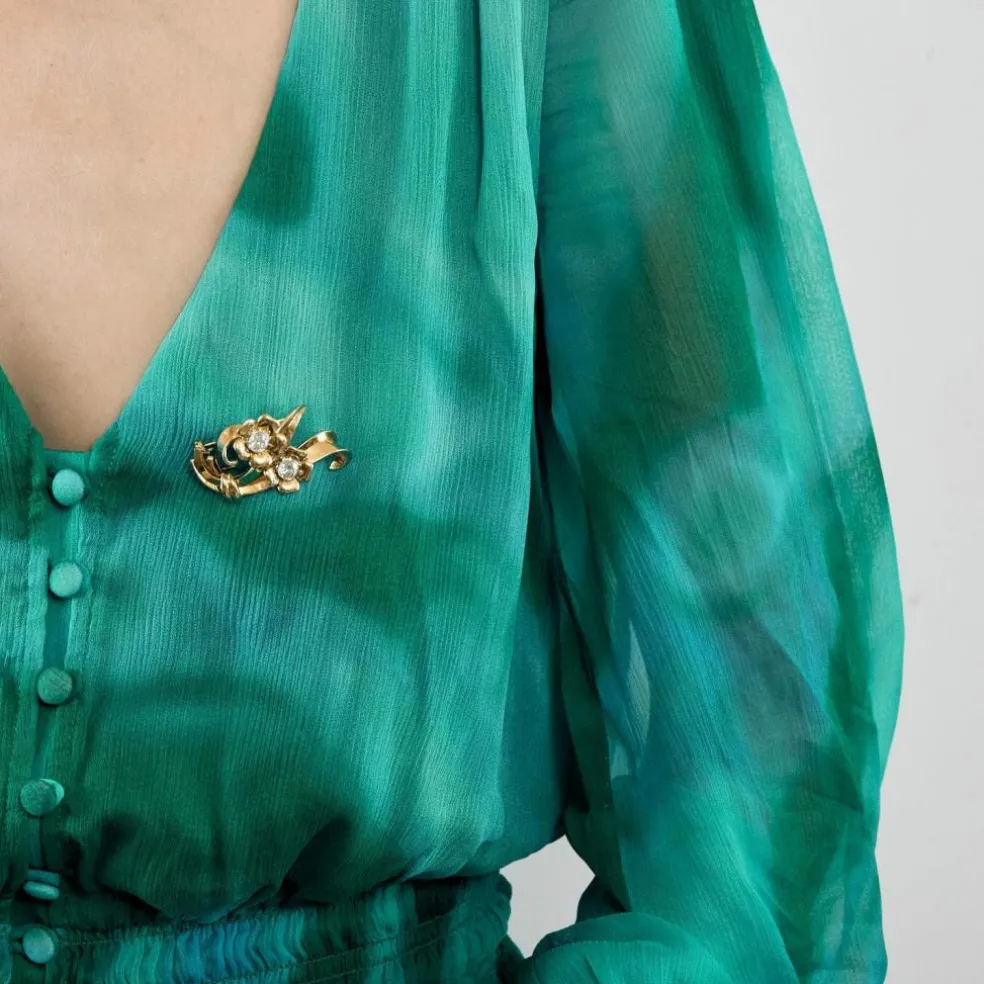 Broche en or jaune et diamants