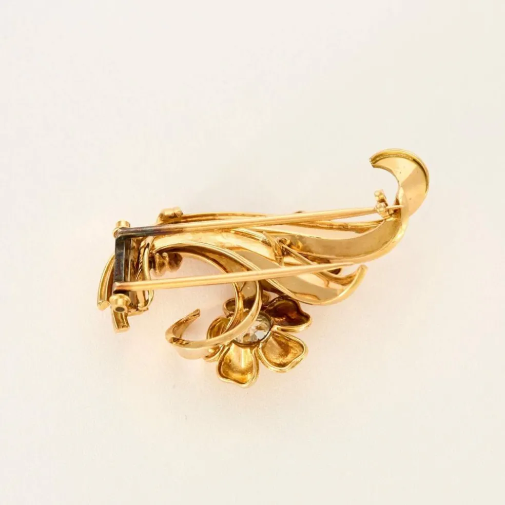 Broche en or jaune et diamants