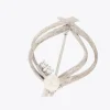 Broche espagnole or blanc perles et diamants