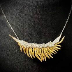 Broche et pendentif ornée de 2 carats de brillants