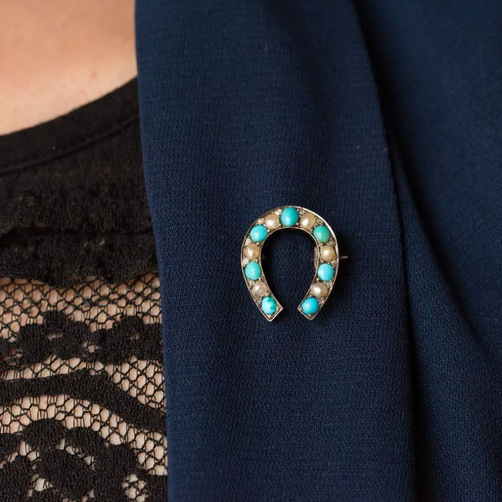 Broche fer à cheval turquoises perles fines diamants