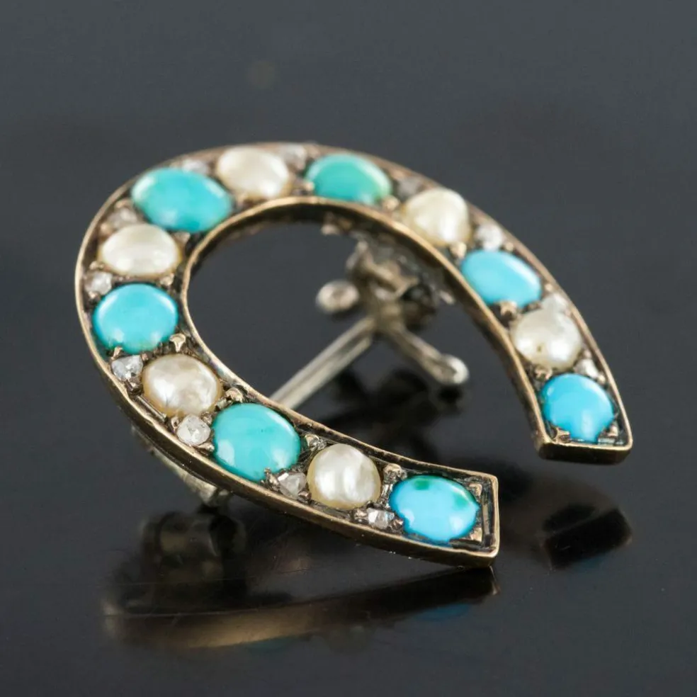 Broche fer à cheval turquoises perles fines diamants