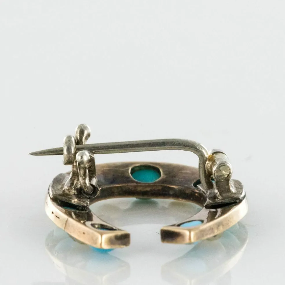 Broche fer à cheval turquoises perles fines diamants