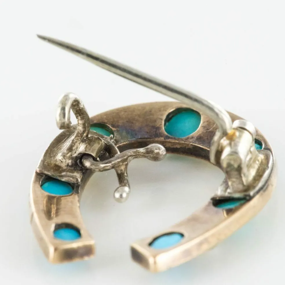 Broche fer à cheval turquoises perles fines diamants