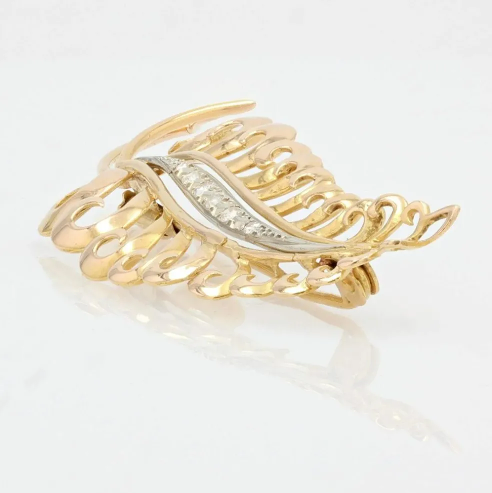 Broche feuille d'or et diamants