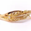 Broche feuille en or jaune