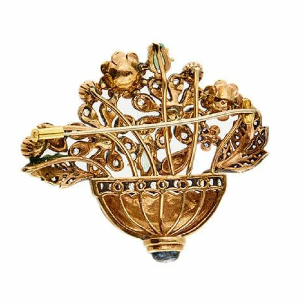 Broche fleur avec diamants et pierres précieuses