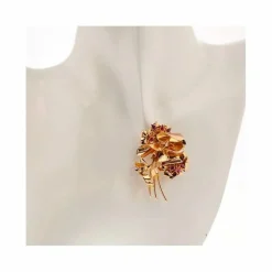 Broche fleurs spinelles en or jaune 12 g