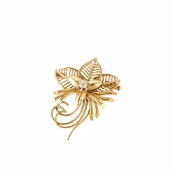Broche florale en or rose et diamant