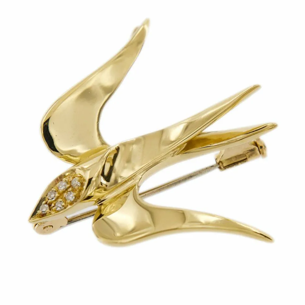 Broche hirondelle diamants